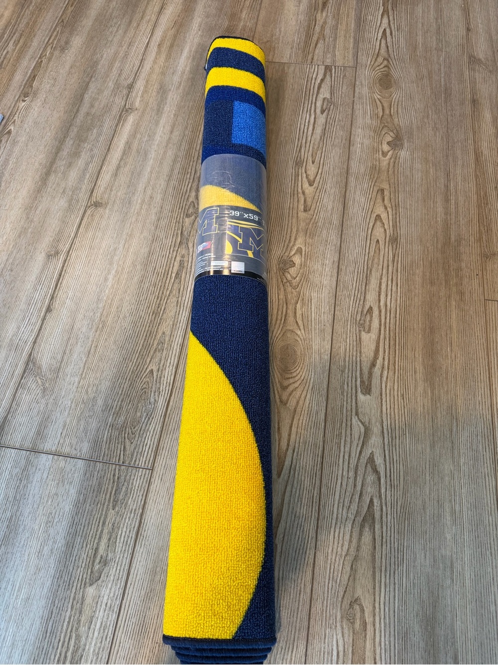 MICHI Navy and Yellow Collegiate Roll-Up Rug